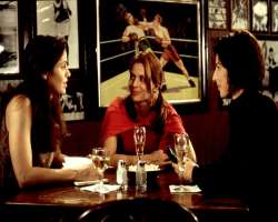 Amy Brenneman consuming alcohol